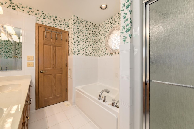 bathroom featuring vanity, separate shower and tub, and tile patterned floors