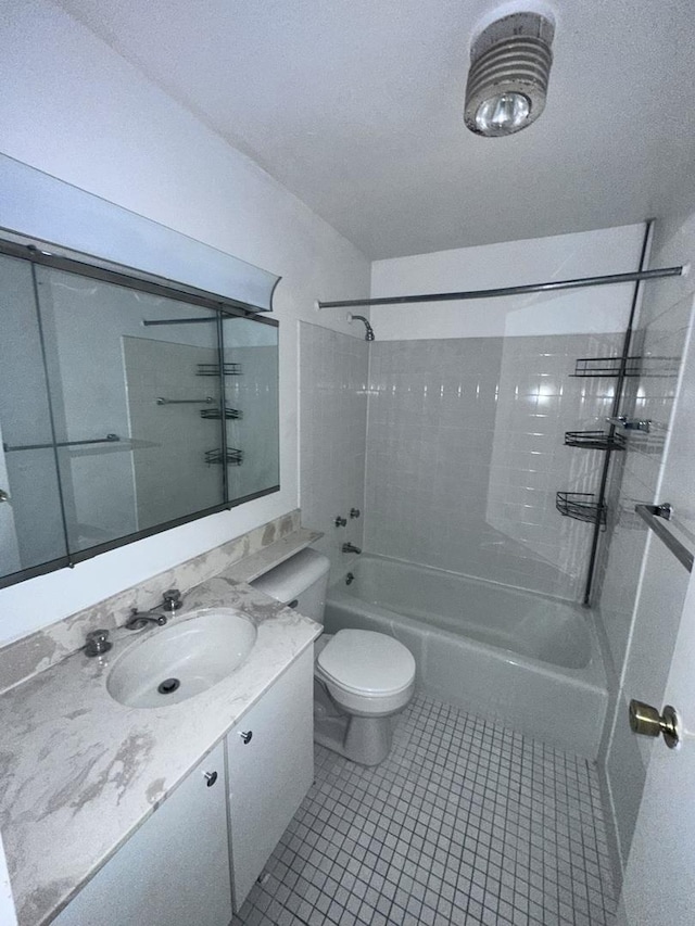 full bathroom featuring vanity, tile patterned flooring, toilet, and shower / bath combination