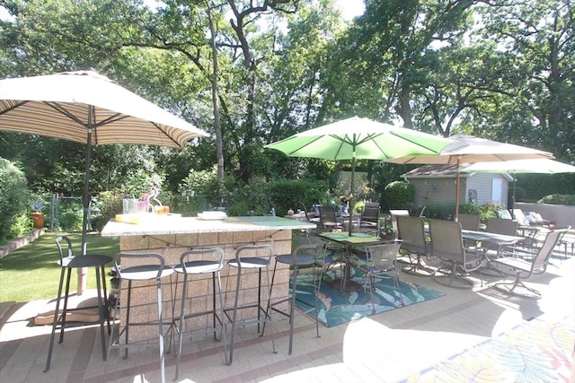 view of patio featuring exterior bar