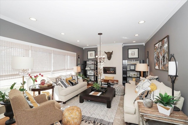 living room featuring crown molding and a notable chandelier