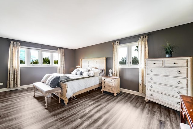 12850 S Westport Dr, Palos Park, IL 60464 - bedroom with dark wood-type flooring and baseboards
