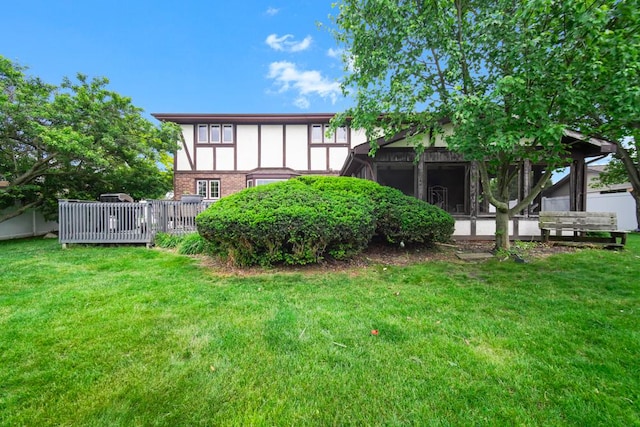 12850 S Westport Dr, Palos Park, IL 60464 - back of house featuring brick siding, a yard, and a sunroom