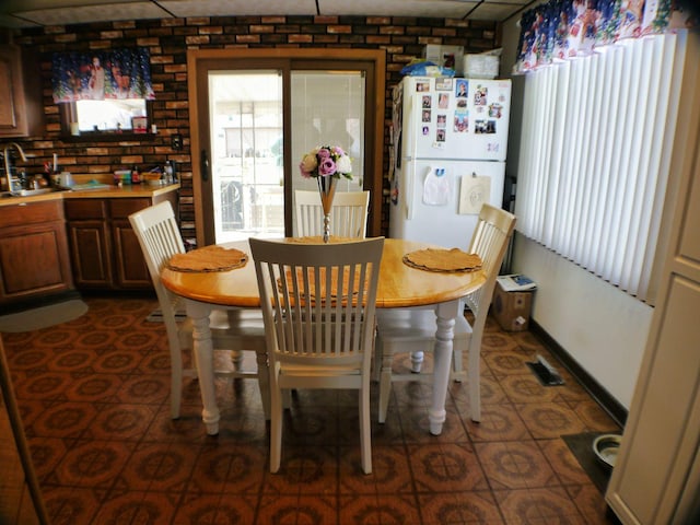 dining area featuring sink