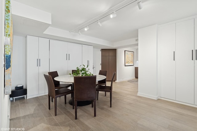 dining area featuring light hardwood / wood-style floors