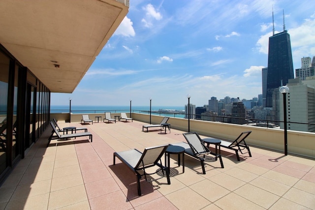 view of patio featuring a water view