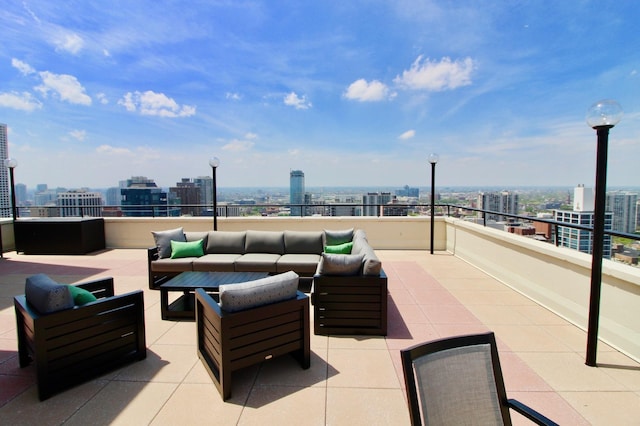 view of patio / terrace with outdoor lounge area and a balcony