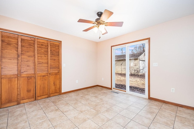 unfurnished bedroom with access to exterior, visible vents, baseboards, and light tile patterned flooring