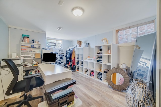 home office featuring light hardwood / wood-style flooring