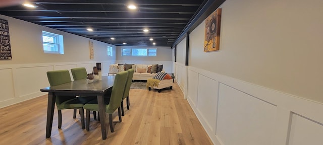 dining area with light hardwood / wood-style floors