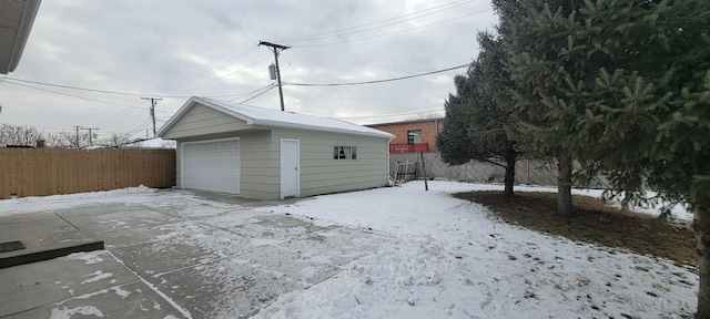 view of snow covered garage