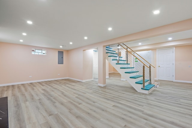 basement featuring light wood-type flooring