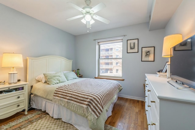 bedroom with ceiling fan and light hardwood / wood-style flooring