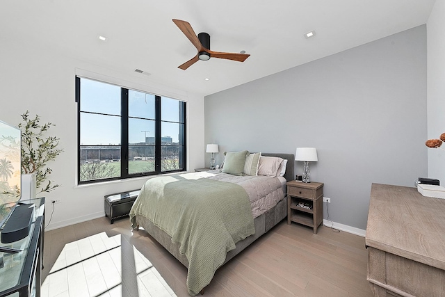 bedroom with visible vents, a ceiling fan, recessed lighting, light wood finished floors, and baseboards