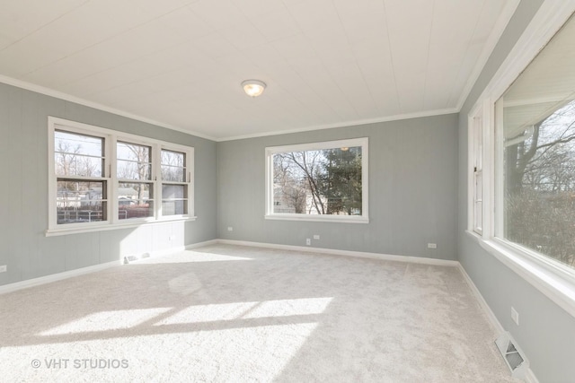 carpeted empty room with ornamental molding