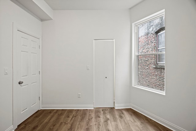 empty room featuring hardwood / wood-style floors