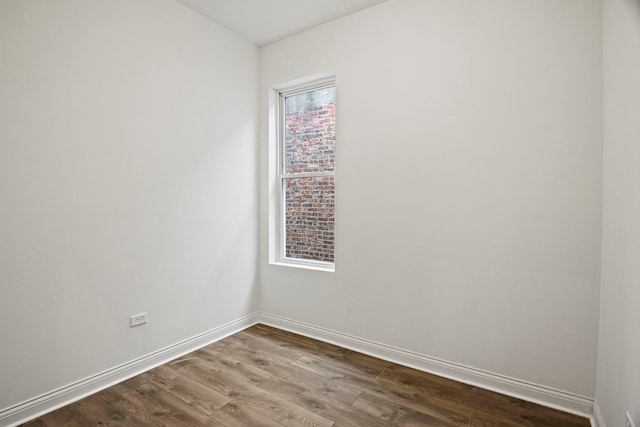 empty room featuring wood-type flooring