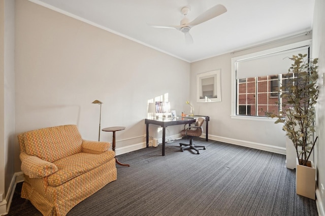 carpeted home office featuring ceiling fan and ornamental molding