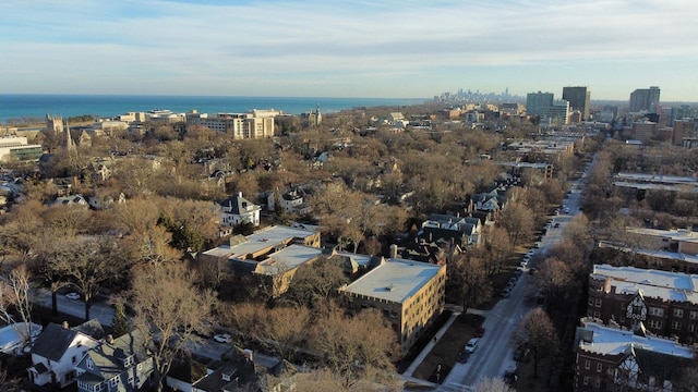 drone / aerial view with a water view