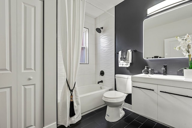 full bathroom featuring tile patterned flooring, toilet, vanity, and shower / bath combo with shower curtain