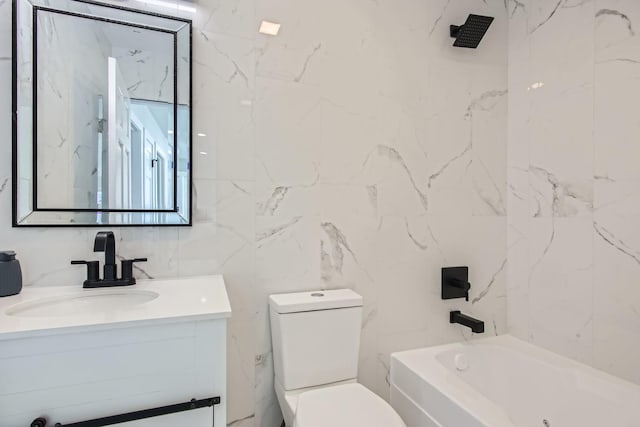 full bathroom with vanity, tile walls, shower / bathtub combination, and toilet