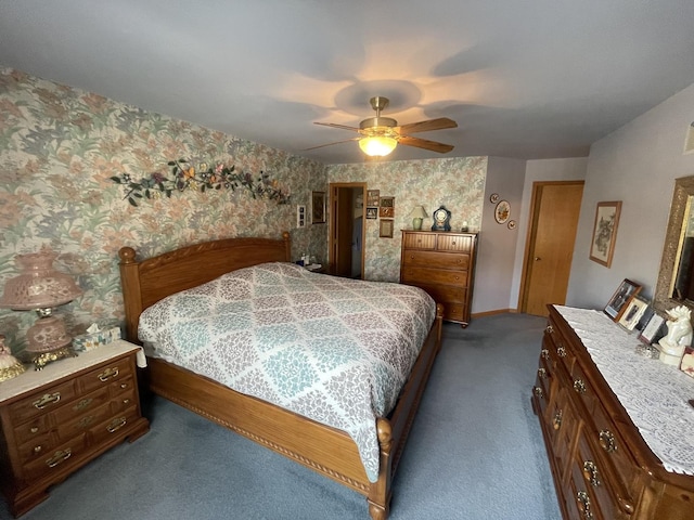 bedroom with ceiling fan and dark colored carpet