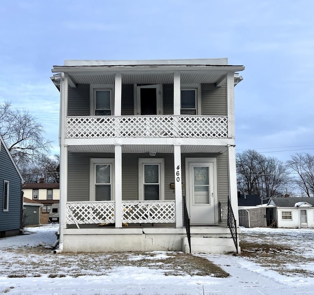 view of front property featuring covered porch