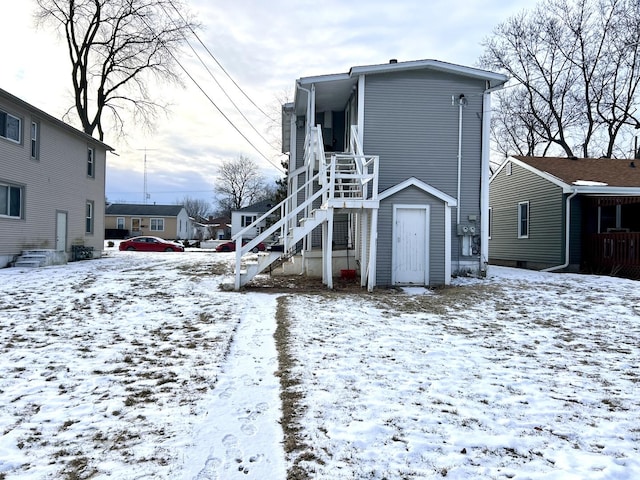 view of snow covered property