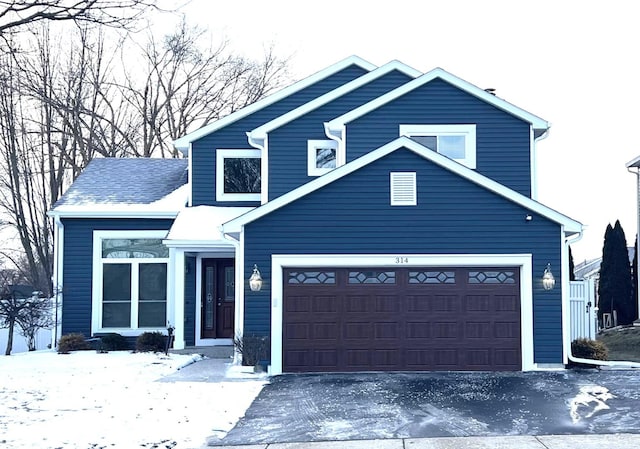 view of front of property featuring a garage