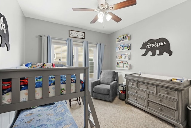 carpeted bedroom featuring ceiling fan