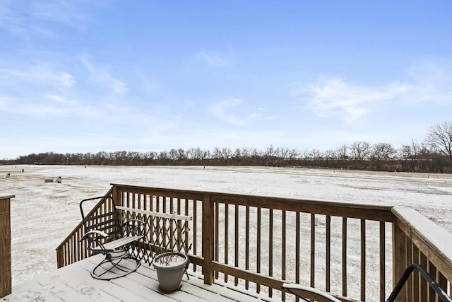 view of snow covered deck