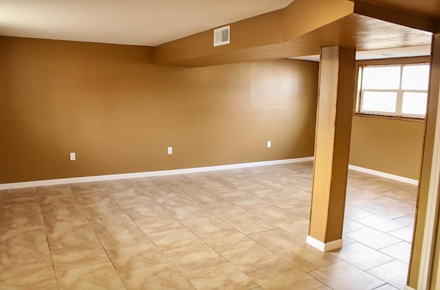 view of tiled spare room