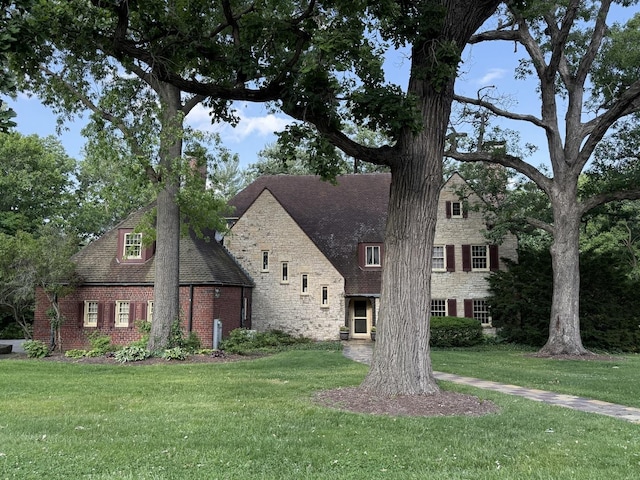2221 Twin Oak Rd, Peru, IL 61354 - view of front of property featuring stone siding, a front yard, and brick siding