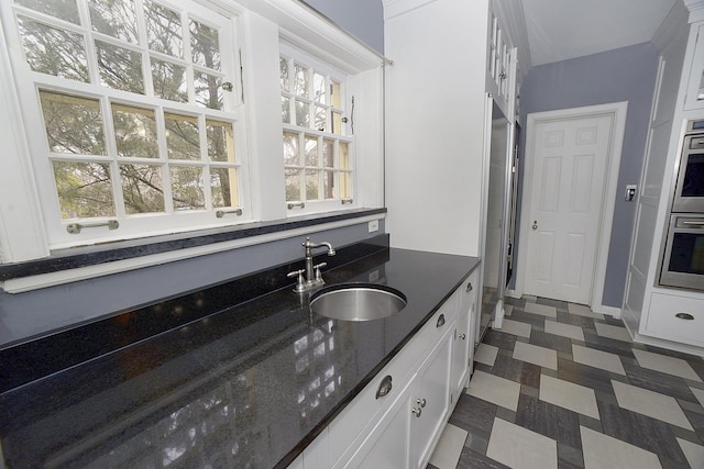 2221 Twin Oak Rd, Peru, IL 61354 - bathroom featuring vanity, tile patterned floors, and baseboards