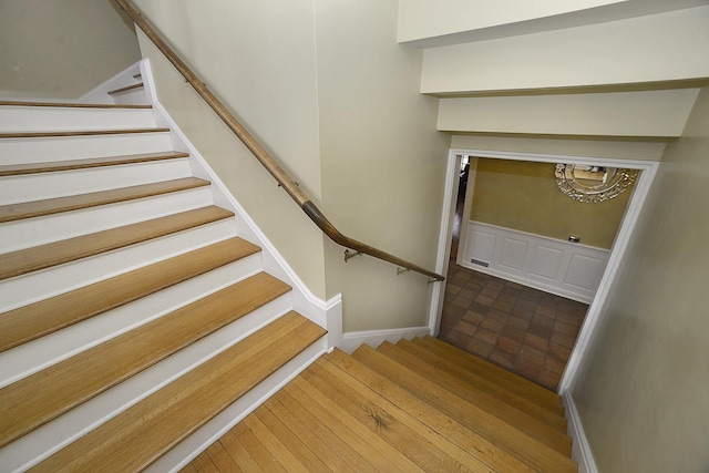 stairs featuring baseboards