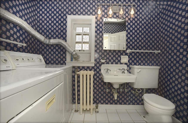 bathroom with independent washer and dryer, wallpapered walls, radiator heating unit, and tile patterned floors