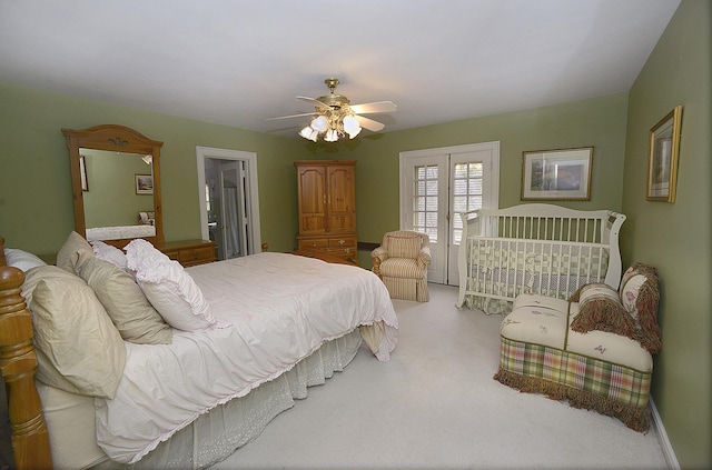 carpeted bedroom featuring a ceiling fan