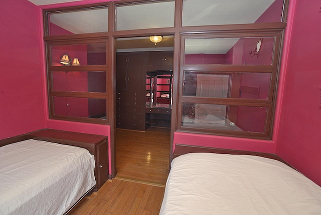 bedroom featuring wood finished floors