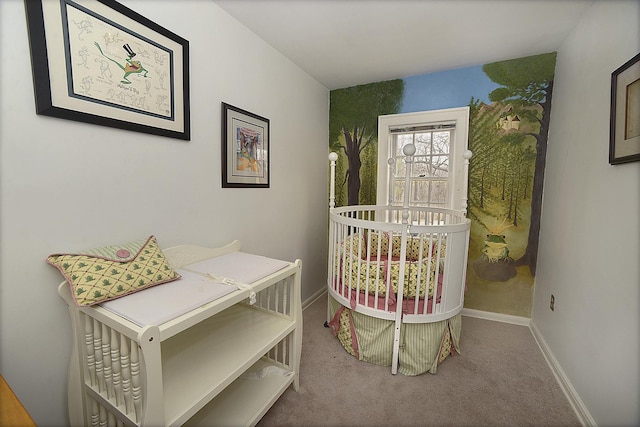 bedroom featuring carpet flooring and baseboards