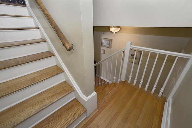 2221 Twin Oak Rd, Peru, IL 61354 - stairway featuring wood finished floors