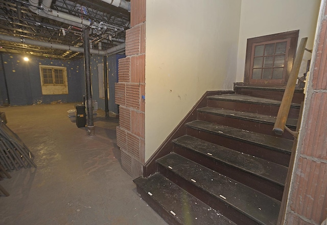stairway with concrete floors