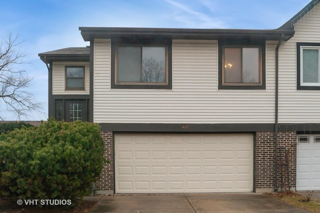 view of side of home with a garage