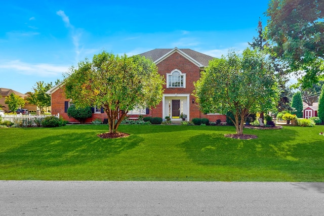 view of front of house featuring a front lawn