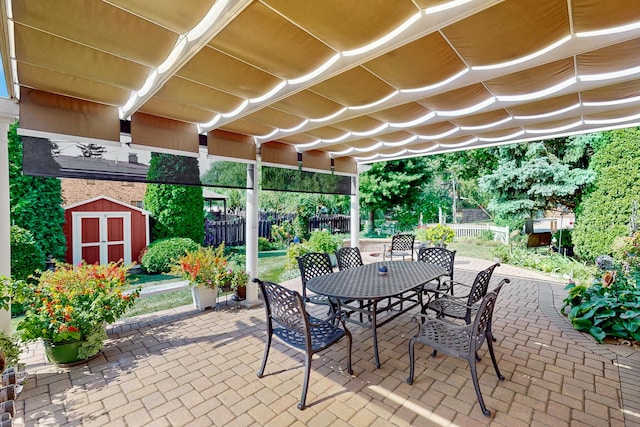 view of patio / terrace with a shed