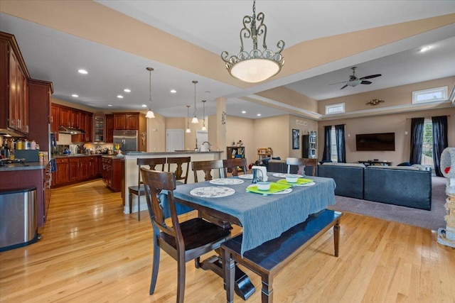 dining room with light wood-style floors, ceiling fan, and recessed lighting