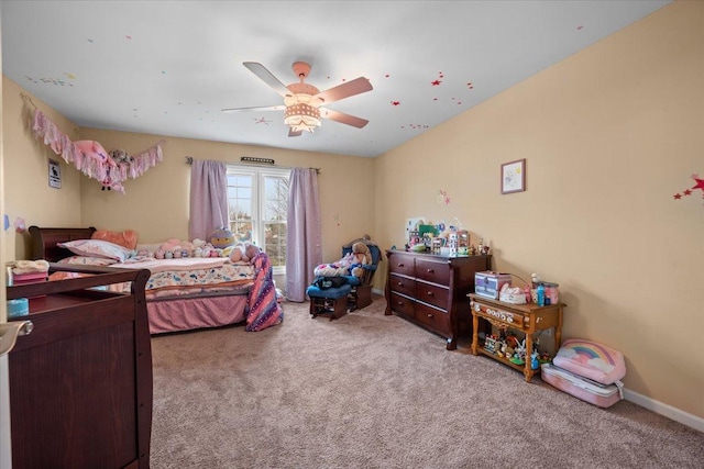 bedroom featuring carpet floors, baseboards, and ceiling fan