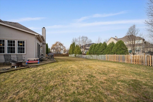 view of yard featuring a fenced backyard and a patio area