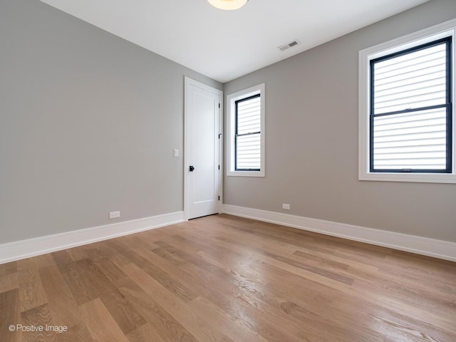 empty room featuring light hardwood / wood-style floors