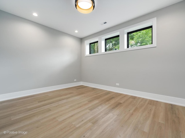 empty room featuring light hardwood / wood-style floors