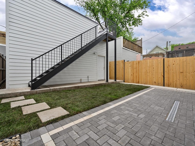 exterior space with a yard and a patio area