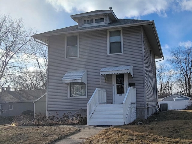 view of front of house with central AC unit